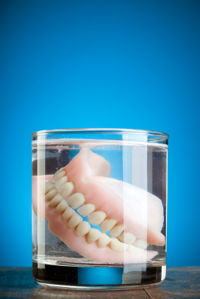 Can Denture Cream Hurt Your Remaining Natural Teeth?